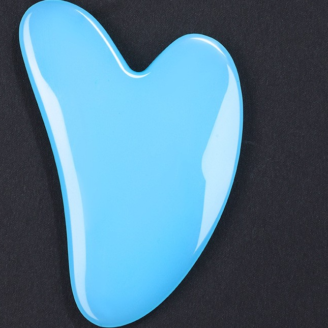 Juego de rodillo de masaje facial y piedra Gua Sha de resina efecto cristal